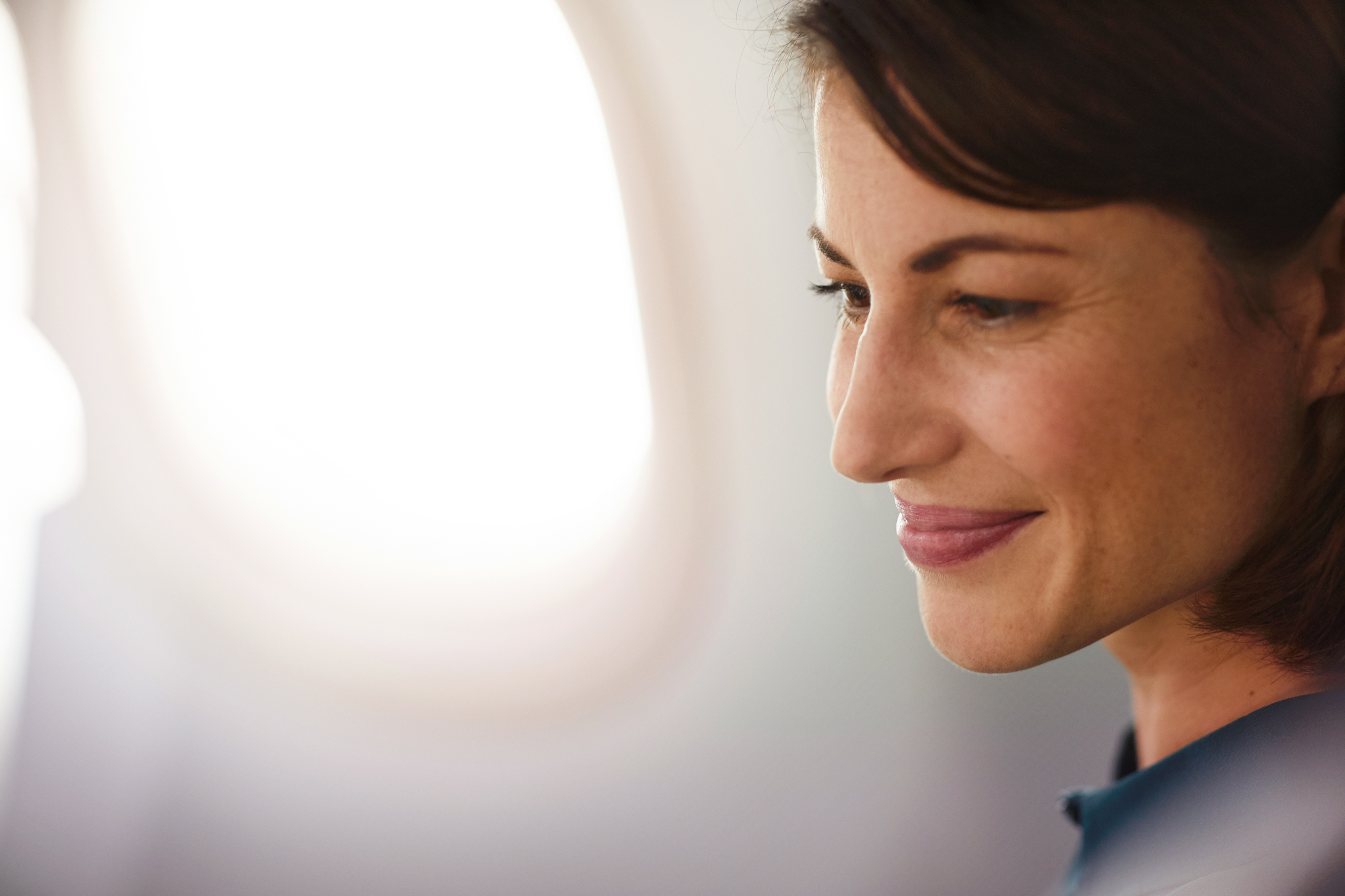Female passenger enjoys flight